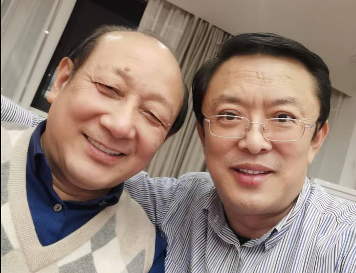 陈世平和陈昌金合照，共同传承义门陈家族文化，弘扬良好家风。